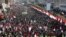 Supporters of Shiite Houthi rebels attend a rally in Sanaa, Yemen, Tuesday, Dec. 5, 2017. The killing of Yemen's ex-President Ali Abdullah Saleh by the country's Shiite rebels on Monday, as their alliance crumbled, has thrown the nearly three-year civil w