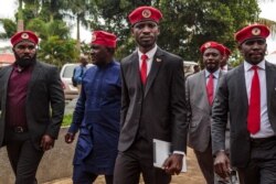 FILE - Singer turned politician Robert Kyagulanyi, also known as Bobi Wine, arrives for a press conference, held at his home in Magere in the outskirts of Kampala, July 24, 2019.