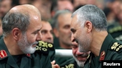 Iran's new Secretary of the Supreme National Security Council Ali Akbar Ahmadian is seen next to the late Iranian Major-General Qasem Soleimani in Tehran, Iran, in this undated picture obtained on May 22, 2023. Office of the Iranian Supreme Leader/WANA via REUTERS