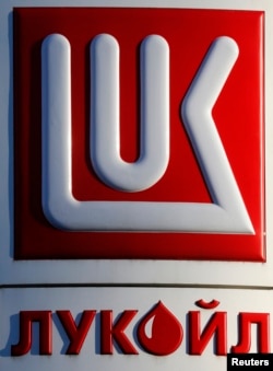 A Lukoil petrol station board is seen in St. Petersburg, Russia, Nov. 26, 2013.