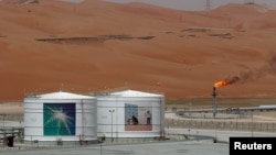 FILE PHOTO: A production facility is seen at Saudi Aramco's Shaybah oilfield in the Empty Quarter, Saudi Arabia, May 22, 2018. REUTERS/Ahmed Jadallah/File Photo