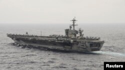 Kapal induk AS USS Theodore Roosevelt (CVN 71) melakukan pelayaran di Laut China Selatan (foto: dok).