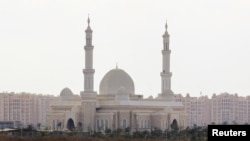 FILE - A general view of buildings and a mosque in the New Administrative Capital (NAC) east of Cairo, Egypt, December 26, 2023. 