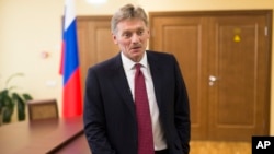 FILE - Kremlin spokesman Dmitry Peskov speaks to the Associated Press in Moscow, Russia, April 5, 2016.