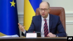 Ministre wa mbere wa Ukraine Arseniy Yatsenyuk mu nama y'abashikiranganji, i Kiev, ku murwa mukuru wa Ukraine. 