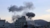 Smoke rises after U.S. aircraft and ships struck Houthi strongholds, according to a U.S. official, in Sanaa, Yemen, Oct. 4, 2024. 