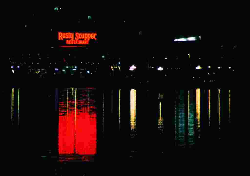 Reflections in the Inner Harbor from the dock at the National Aquarium.