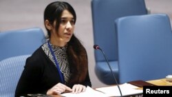 FILE - Nadia Murad Basee, a 21-year-old Iraqi woman of the Yazidi faith, speaks to members of the Security Council during a meeting at the United Nations headquarters in New York.