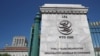 FILE - A logo is pictured on the headquarters of the World Trade Organization in Geneva, Switzerland, June 2, 2020. 