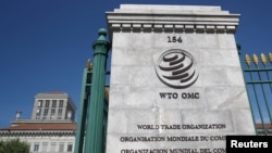 FILE - A logo is pictured on the headquarters of the World Trade Organization (WTO) in Geneva, Switzerland, June 2, 2020. 