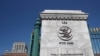 FILE - Signage is seen at the headquarters of the World Trade Organization (WTO) in Geneva, Switzerland, June 2, 2020. 