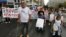 Disabled Greeks march during a rally against new austerity measures, in central Athens, September 12, 2012.