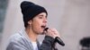 Justin Bieber Storms UK Charts to Equal John Lennon's 1981 Feat