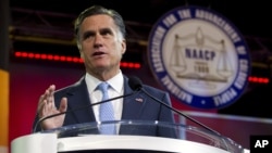 Republican presidential candidate Mitt Romney gestures during a speech to the NAACP annual convention in Houston, Texas, July 11, 2012. 