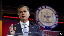 Republican presidential candidate, former Massachusetts Gov. Mitt Romney gestures during a speech to the NAACP annual convention in Houston, Texas, July 11, 2012. 