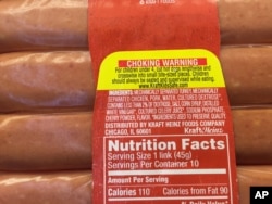 This photo shows the ingredients and nutrition label on a package of Oscar Mayer classic uncured wieners for sale at a grocery store in New York, June 28, 2017. The label lists cultured celery juice as an ingredient. Oscar Mayer is touting its new hot dog recipe that uses nitrite derived from celery juice instead of artificial sodium nitrite, which is used to preserve the pinkish colors of processed meats and prevents botulism.