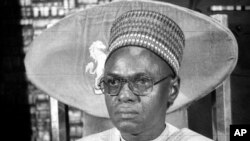 FILE - In this B/W file photo dated circa 1983, showing President of Nigeria Shehu Shagari, at a press conference in Lagos. 