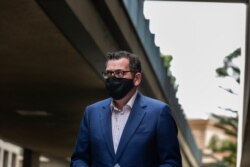 Premier of Victoria Daniel Andrews arrives for a news conference in Melbourne, Australia, Aug. 5, 2020.