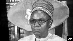 FILE - In this B/W file photo dated circa 1983, showing President of Nigeria Shehu Shagari, at a press conference in Lagos. 