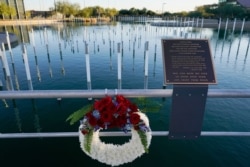 A Veterans Day wreath left Nov. 11, 2020, in Scottsdale, Ariz., at the USS Arizona Memorial Gardens, a site honoring each of the ship's 1,512 crew members, including the 1,177 who died at Pearl Harbor.