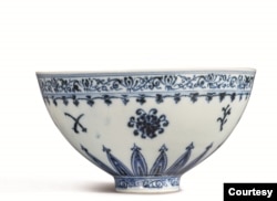 COURTESY SOTHEBY'S This photo shows a small porcelain bowl bought for $35 at a Connecticut yard sale that turned out to be a rare Chinese artifact worth between $300,000 and $500,000. The bowl will be offered in Sotheby's Auction of Important Chinese Art, in New York, on March 17. (Courtesy Sotheby’s)