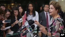 Brazil’s President Dilma Rousseff speaks about proposed budget cuts during a press conference at the Planalto Presidential Palace, in Brasilia, Sept. 15, 2015. 