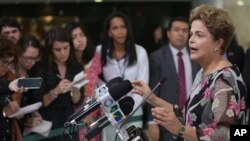 FILE - Brazil’s President Dilma Rousseff speaks about proposed budget cuts during a press conference at the Planalto Presidential Palace, in Brasilia, Sept. 15, 2015.