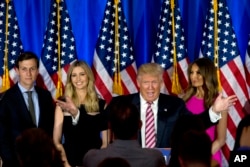 FILE - Then-Republican presidential candidate Donald Trump is joined by his wife, Melania; his daughter, Ivanka; and his son-in-law, Jared Kushner, as he speaks during a news conference at the Trump National Golf Club Westchester, June 7, 2016, in New York.