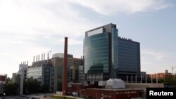 FILE - From left, the CDC buildings; the Special Bacteriology Reference Laboratory, the Bioterrorism Rapid Response and Advanced Technology laboratory and the Biotechnology Core Facility are shown in Atlanta, Georgia, June 20, 2014.