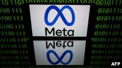 FILE - A tablet displays the Meta logo, Jan. 12, 2023.