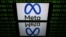 FILE - This picture taken on Jan. 12, 2023, in Toulouse, France, shows a tablet displaying the logo of the company Meta. The company is reportedly planning to offer European users subscription-based versions of Instagram and Facebook.