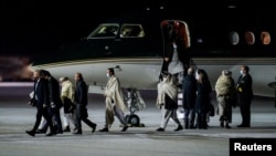 Representatives of the Taliban arrive in Norway to have talks with Western representatives about human rights and emergency aid, in Gardermoen, Norway, Jan. 22, 2022. 