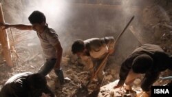 Rescue teams search for victims in the earthquake-stricken village of Varzaghan in East Azarbaijan August 11, 2012. Two powerful earthquakes killed 250 people and injured around 1,800 in northwest Iran, where rescue workers frantically combed the rubble o