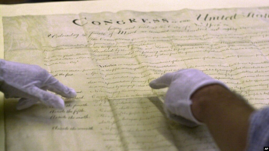 File Workers At The M Achusetts State Archives In Boston Point To A Section Of An File Workers At The M Achusetts State Archives In Boston Point To A Section Of An