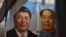 现任中共总书记习近平和前中共领导人毛泽东的画像并排挂在北京的一个市场上(2017年9月19日)