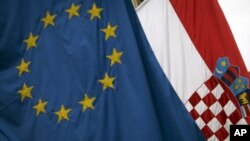 The European Union and Croatian flags