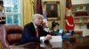 FILE - U.S. President Donald Trump is seen during a phone call at the Oval Office of the White House, in Washington, June 27, 2017.