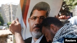 Un partisan de Mohamed Morsi (Le Caire, 5 juillet 2013)