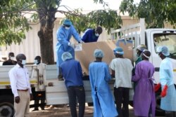COVID-19 vaccines arrive to be destroyed, in Lilongwe, Malawi, May 19, 2021. Malawi has burned nearly 20,000 doses of AstraZeneca vaccines because they had expired.
