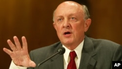 FILE - Former CIA Director James Woolsey testifies on Capitol Hill, Aug. 16, 2004, in Washington.