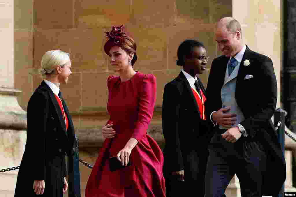 Britain's Catherine, Duchess of Cambridge, and Britain's Prince William, Duke of Cambridge, arrive for the wedding of Britain's Princess Eugenie of York to Jack Brooksbank at St George's Chapel, Windsor Castle, in Windsor, Britain, Oct. 12, 2018.