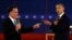Republican presidential nominee Mitt Romney, left, and President Barack Obama spar during a presidential debate at Hofstra University in Hempstead, New York, Oct. 16, 2012.
