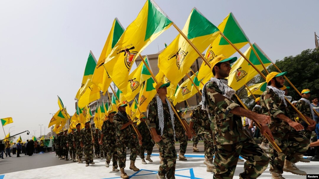 Nhóm dân quân Kataib Hezbollah trong một lễ diễu hành
