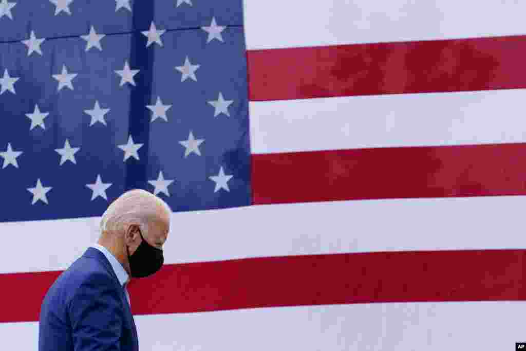 Democratic presidential candidate former Vice President Joe Biden departs after speaking at a campaign event on manufacturing American products at UAW Region 1 headquarters in Warren, Mich., Sept. 9, 2020.