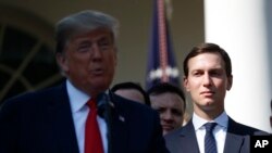 FILE - White House Senior Adviser Jared Kushner, right, listens as President Donald Trump speaks in the Rose Garden of the White House, in Washington, Oct. 1, 2018.