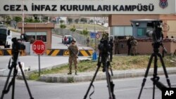 Cameras of members of the media are placed across from the prison complex in Aliaga, Izmir province, western Turkey, where jailed pastor Andrew Craig Brunson appeared on his trial at a court inside the complex, April 16, 2018. 
