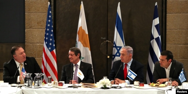 Israeli Prime Minister Benjamin Netanyahu, U.S. Secretary of State Mike Pompeo, Greek Prime Minister Alexis Tsipras and Cypriot President Nicos Anastasiades chat during their meeting in Jerusalem, March 20, 2019.