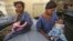 FILE - Women sit with their newborn babies in a ward of the Lagos Island Maternity Hospital in Lagos, Nigeria, Oct. 31, 2011.