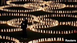 Paper lanterns are lit for the victims of the March 11, 2011, earthquake and tsunami disaster that killed thousands and led to the worst nuclear accident since Chernobyl, in Tokyo, Japan.