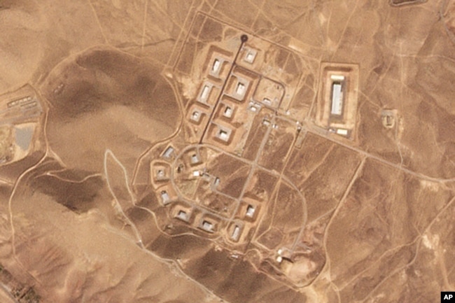 This satellite photo from Planet Labs PBC shows damaged buildings at Iran's Khojir military base outside of Tehran, Oct. 8, 2024. (Planet Labs PBC via AP)